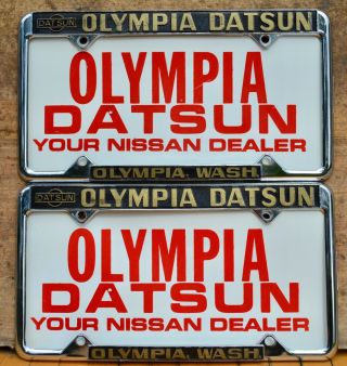 Set 2 VTG embossed Metal License Plate Frame,  Inserts OLYMPIA DATSUN NISSAN WA 8