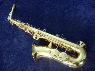 PRETTY VINTAGE CONN SHOOTING STARS ALTO SAXOPHONE,  CASE 7