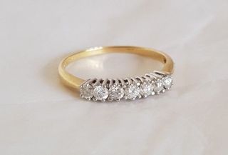 An 18ct White & Yellow Gold half Eternity Ring.  Set with Brilliant cut Diamonds 2