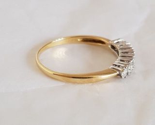 An 18ct White & Yellow Gold half Eternity Ring.  Set with Brilliant cut Diamonds 4