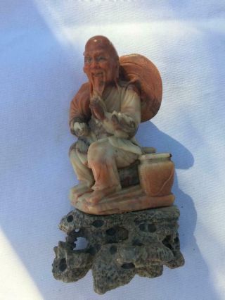 Antique Hand Carved Soapstone Of An Old Man On Rock Stand