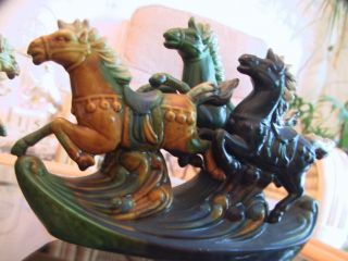 Rare and collectable vintage Oriental figurines of gallloping horses bookends. 2