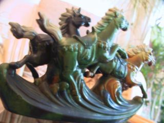 Rare and collectable vintage Oriental figurines of gallloping horses bookends. 3