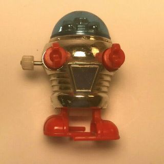 Vintage 1978 Tomy Wind Up Robot Chrome Plastic Orange Hands Feet Blue Head
