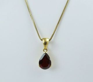 Vintage 14k gold 5 cwt deep red garnet pear shaped pendant 14k gold chain 5