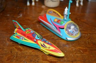 2 Tin Toys Japan Made Moon Rocket & Patrol Rocket 6in 5in Long