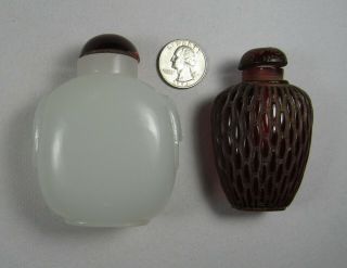 2 Chinese Hand Carved Perfume / Snuff Bottles,  1 Glass & 1 Amber