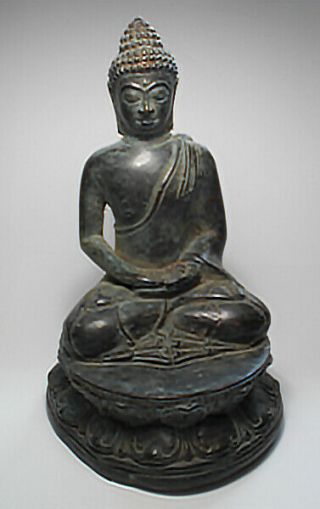 A Bronze Figure Of A Seated Buddha,  Se Asia