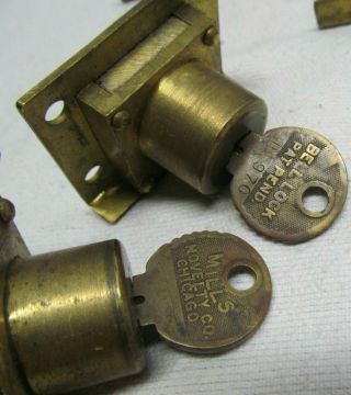 (7) Seven MILLS Novelty Co antique slot machine locks,  Bell keys 4