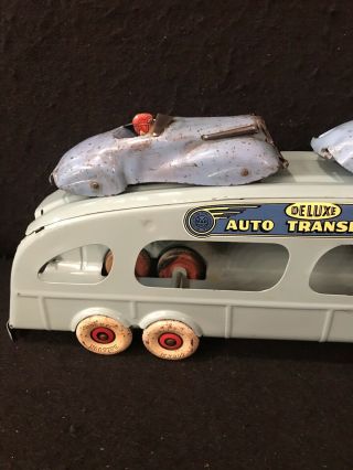VINTAGE MARX PRESSED STEEL DELUXE AUTO TRANSPORT WITH TWO CARS HAVING DRIVERS 4