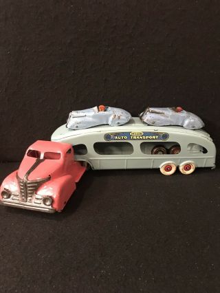 VINTAGE MARX PRESSED STEEL DELUXE AUTO TRANSPORT WITH TWO CARS HAVING DRIVERS 5