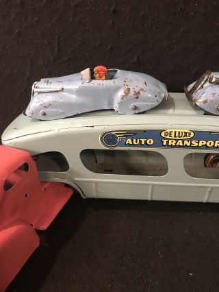 VINTAGE MARX PRESSED STEEL DELUXE AUTO TRANSPORT WITH TWO CARS HAVING DRIVERS 7