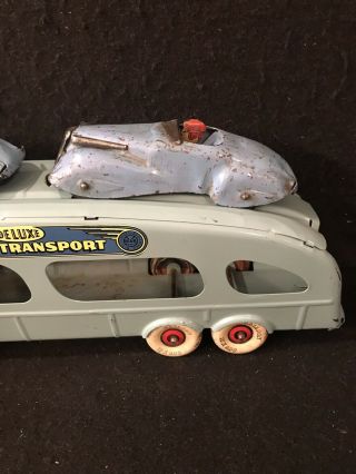 VINTAGE MARX PRESSED STEEL DELUXE AUTO TRANSPORT WITH TWO CARS HAVING DRIVERS 8