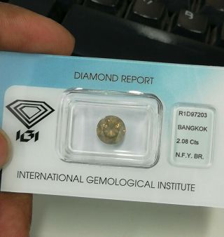 2.  08 Cts Very Rare IGI Certified Natural Fancy Yellow Brown Color Diamond 3