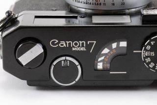 (167) RARE & Black Paint Canon 7 w/50/1.  4 lens & front cap 7