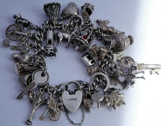 Stunning Heavy Vintage Solid Silver Charm Bracelet & 32 Charms.  Rare,  Open,  Move