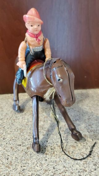 Occupied Japan Tin and Celluloid Cowboy on Horse Wind - up Toy 2