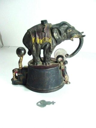 Antique J & E Stevens Cast Iron Mechanical Elephant Bank W Clowns - -.  1882