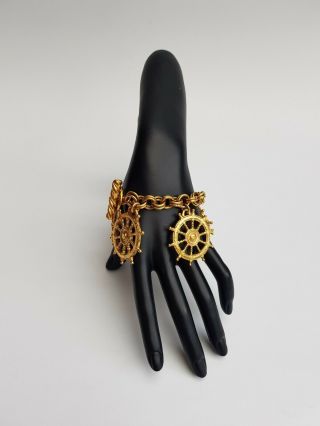 Ysl Bracelet.  Yves Saint Laurent Vintage Gold Tone Ship Steering Wheel Bracelet