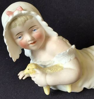 7 - 1/2” ANTIQUE ALL BISQUE PIANO BABY W/LAMB,  MOLD 345,  GERMANY 3