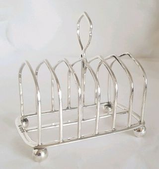 Edwardian sterling silver toast rack.  Sheffield 1914.  By Hawksworth Eyre & Co 2