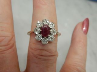 A 9 Ct Gold Large Ruby And Diamond Cluster Ring