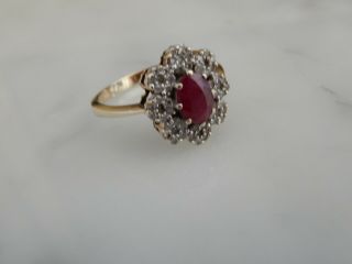 A 9 CT GOLD LARGE RUBY AND DIAMOND CLUSTER RING 2