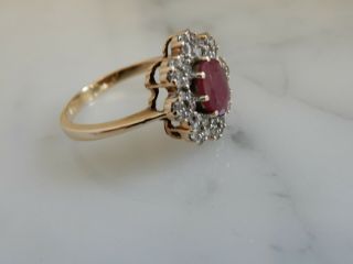 A 9 CT GOLD LARGE RUBY AND DIAMOND CLUSTER RING 3