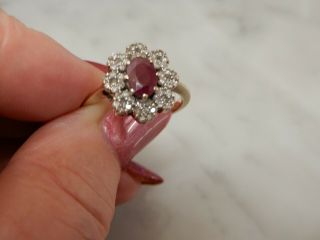 A 9 CT GOLD LARGE RUBY AND DIAMOND CLUSTER RING 6