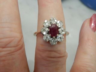 A 9 CT GOLD LARGE RUBY AND DIAMOND CLUSTER RING 8