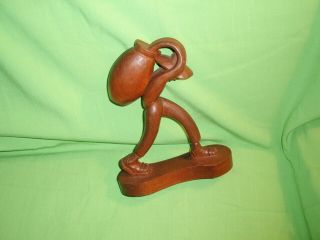 VINTAGE HAND CARVED WOOD FIGURINE OF MAN WITH BASKET BY J PINAL FROM MEXICO 2