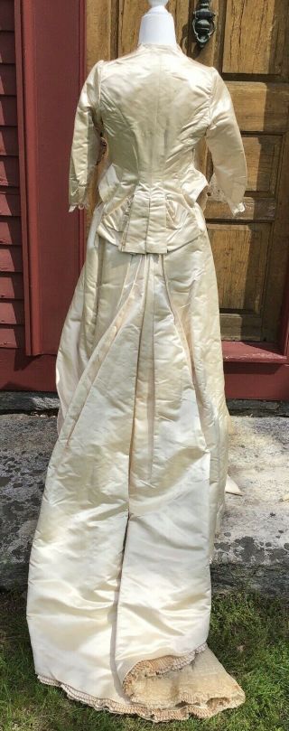 1870 - 1880 ANTIQUE WEDDING GOWN IVORY SATIN PLEATED AND WITH LACE TRIM 3