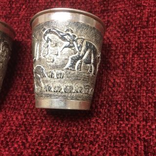 A set of FOUR old (antique?) Solid Silver Cups,  oriental motiffs 2