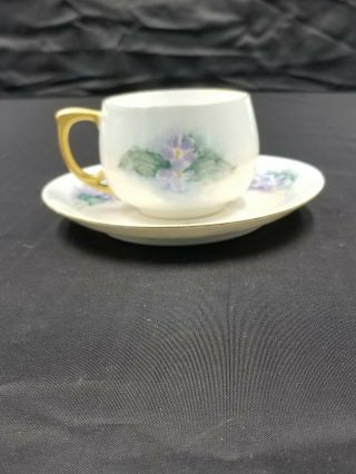 8 Oz Tea Cup And Saucer With Violet Painted Flowers.  Gold Rimmed And Gold Handle