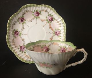 Antique Hand Painted Porcelain Cup And Saucer