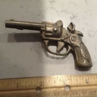vintage toy metal pistol and holster,  I believe it ' s a cap pistol,  1940/1950 iss 2