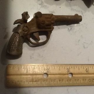 vintage toy metal pistol and holster,  I believe it ' s a cap pistol,  1940/1950 iss 4