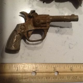 vintage toy metal pistol and holster,  I believe it ' s a cap pistol,  1940/1950 iss 5