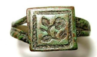 Ancient Medieval bronze finger ring with flower on bezel. 2