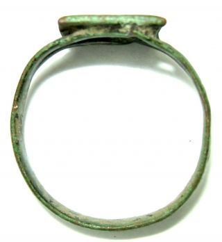 Ancient Medieval bronze finger ring with flower on bezel. 5