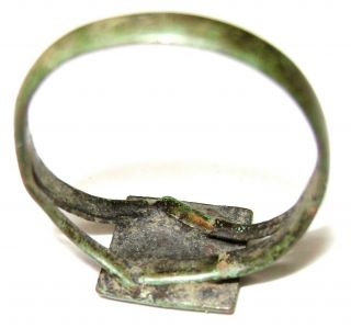 Ancient Medieval bronze finger ring with flower on bezel. 6