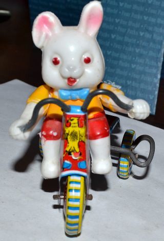 VTG TIN TOY WIND UP BLOW MOLD EASTER BUNNY RABBIT RIDING BIKE BELL RINGS, 4