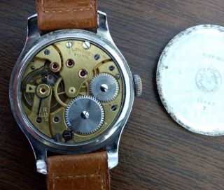 Vintage 1940s Longines Wristwatch.  Coinedge case.  Patina Dial.  Cal 12.  68z 10