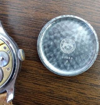 Vintage 1940s Longines Wristwatch.  Coinedge case.  Patina Dial.  Cal 12.  68z 11