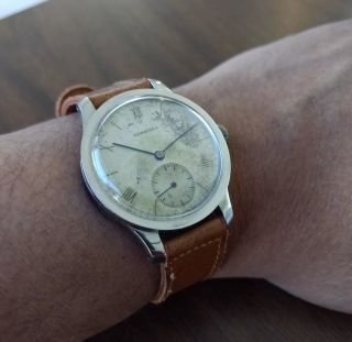Vintage 1940s Longines Wristwatch.  Coinedge case.  Patina Dial.  Cal 12.  68z 2
