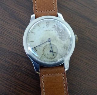 Vintage 1940s Longines Wristwatch.  Coinedge case.  Patina Dial.  Cal 12.  68z 3