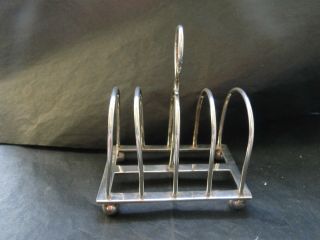Small Toast Rack On 4 Ball Feet Made In Sterling Silver In Sheffield 1934