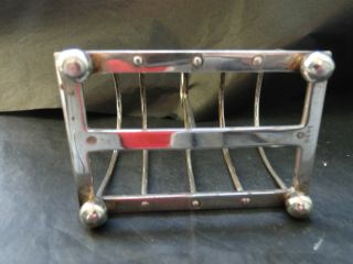 SMALL TOAST RACK ON 4 BALL FEET MADE IN STERLING SILVER IN SHEFFIELD 1934 3