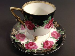3 Footed Demitasse Cup & Saucer.  Damask Rose.  Roses With Gold Accents