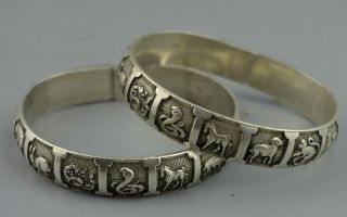 China Collectable Handwork Old Miao Silver Carve 12 Zodiac One Pair Bracelets